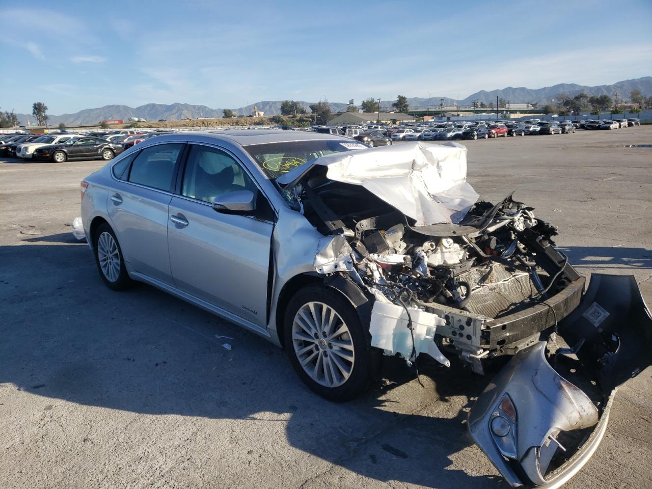 TOYOTA AVALON HYB 2014 with VIN 4T1BD1EB7EU034381 - Photo from auction