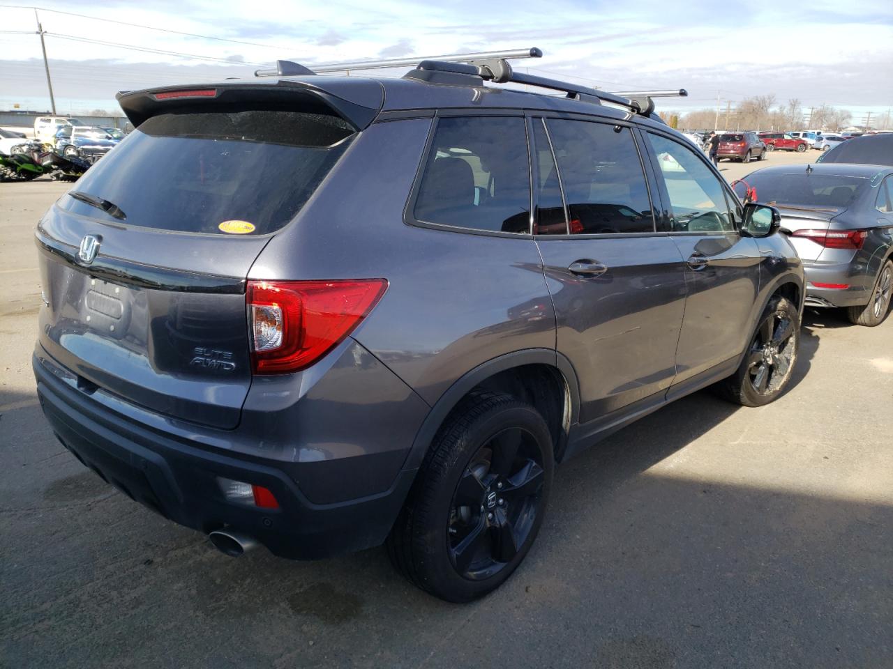 Photo 4 from auction – 2020 HONDA PASSPORT E with VIN 5FNYF8H02LB014184