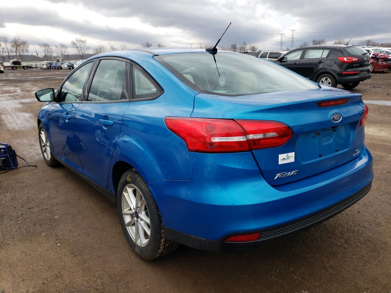 Photo 3 from auction – 2015 FORD FOCUS SE with VIN 1FADP3F28FL305962