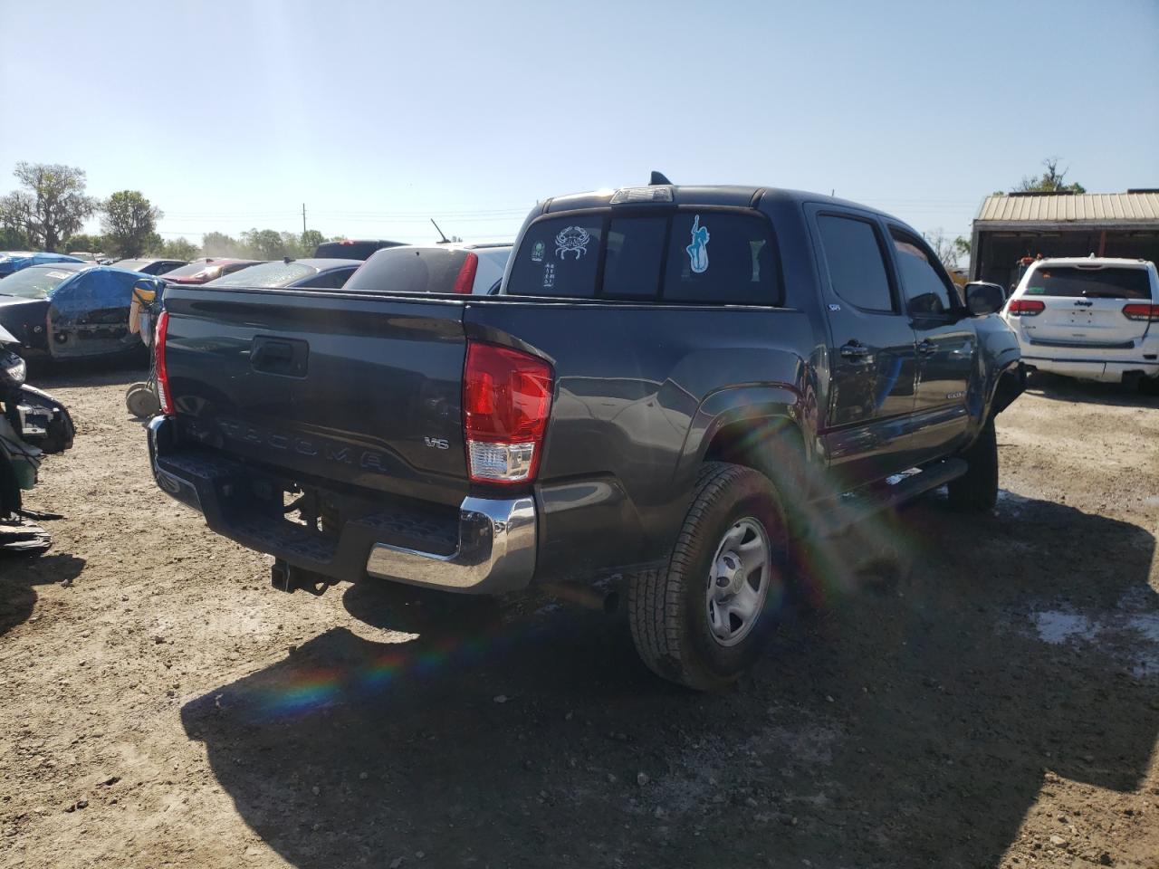 Photo 4 from auction – 2016 TOYOTA TACOMA DOU with VIN 3TMAZ5CN3GM019700