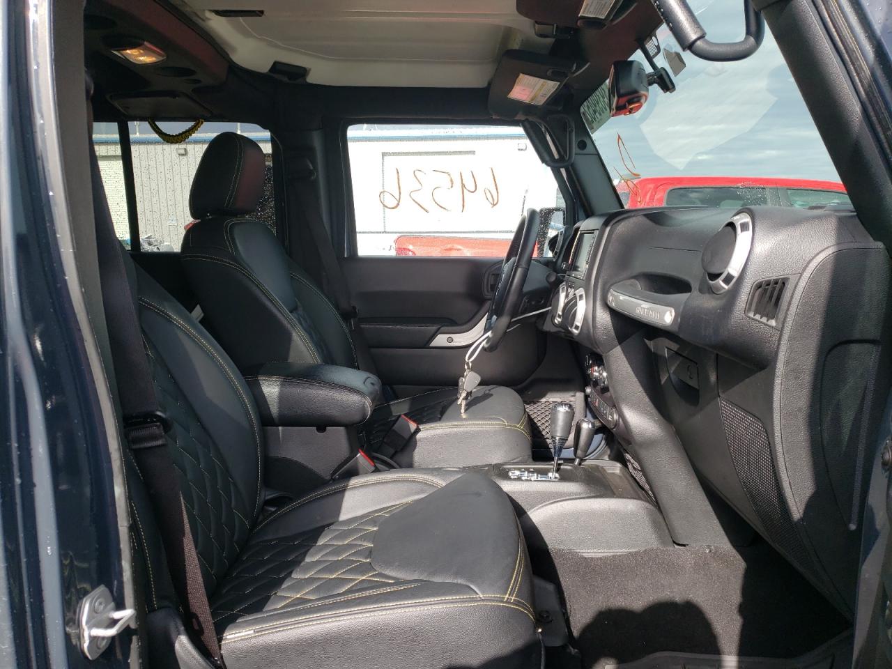Zdjęcie 5 z aukcji – 2016 JEEP WRANGLER U z VIN 1C4BJWFG3GL310942