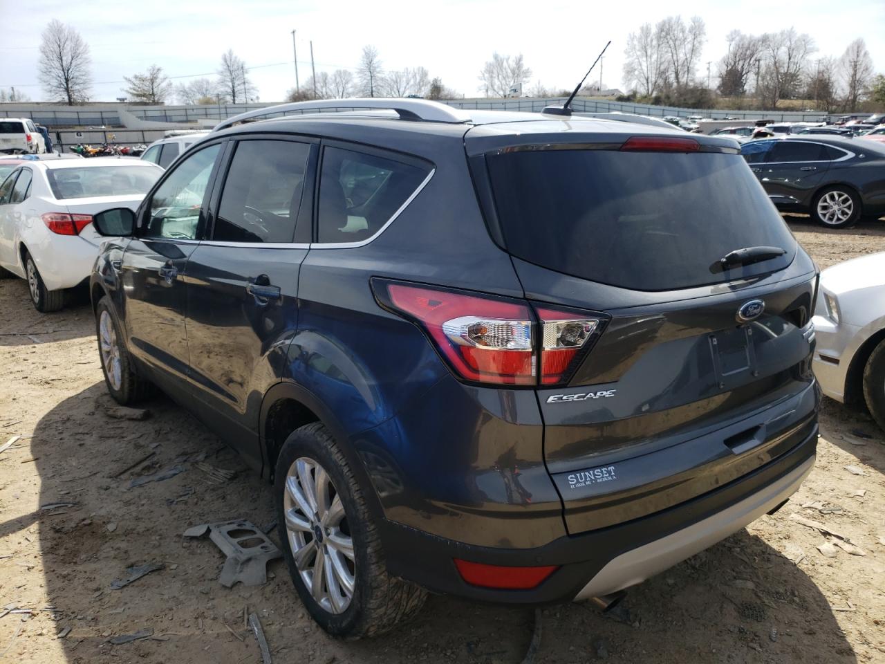 Photo 3 from auction – 2017 FORD ESCAPE TIT with VIN 1FMCU0JD0HUE05603