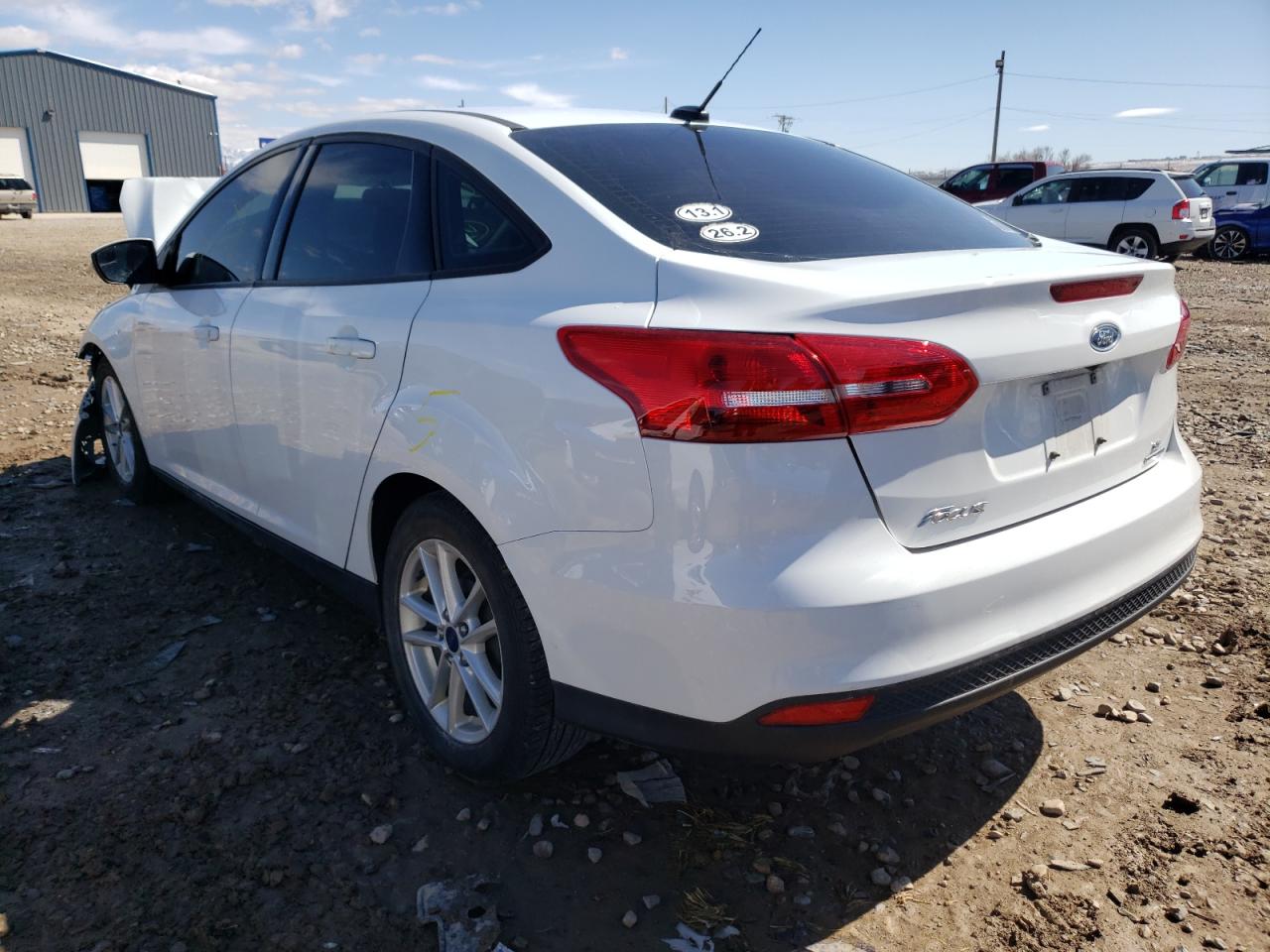 Photo 3 from auction – 2016 FORD FOCUS SE with VIN 1FADP3F23GL383714