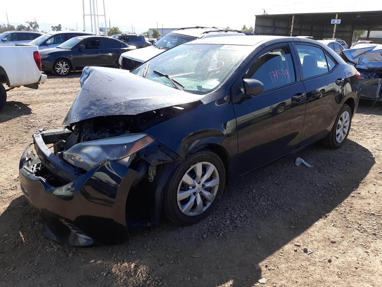Photo 2 from auction – 2015 TOYOTA COROLLA L with VIN 5YFBURHE1FP324557