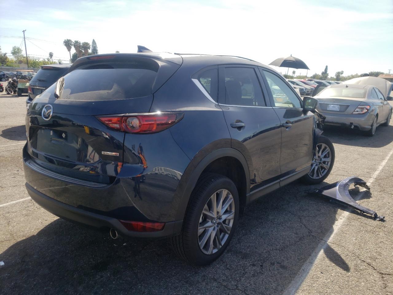 Photo 4 from auction – 2021 MAZDA CX-5 GRAND with VIN JM3KFADM2M0482641