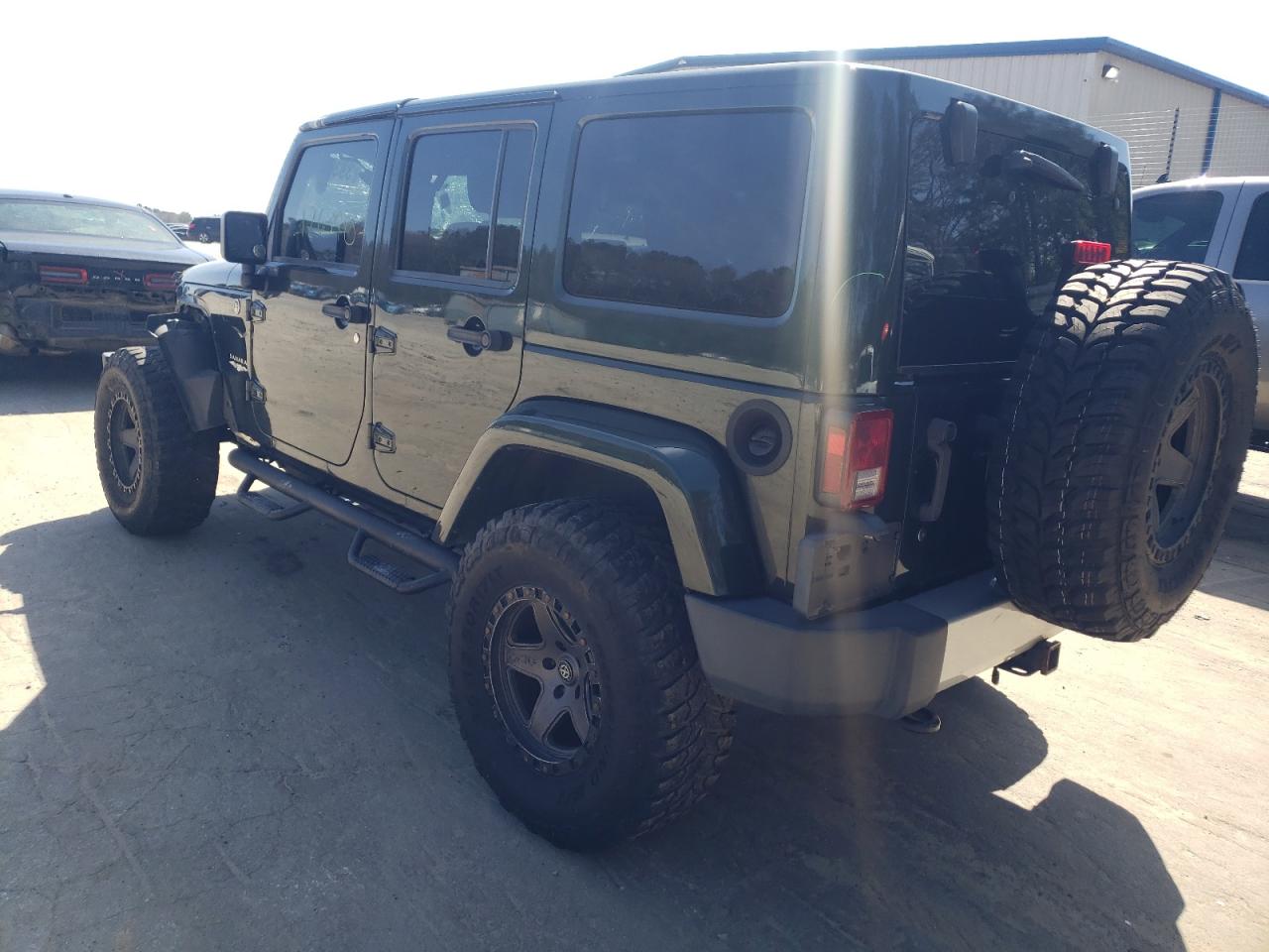 Photo 3 from auction – 2011 JEEP WRANGLER U with VIN 1J4BA5H14BL561183