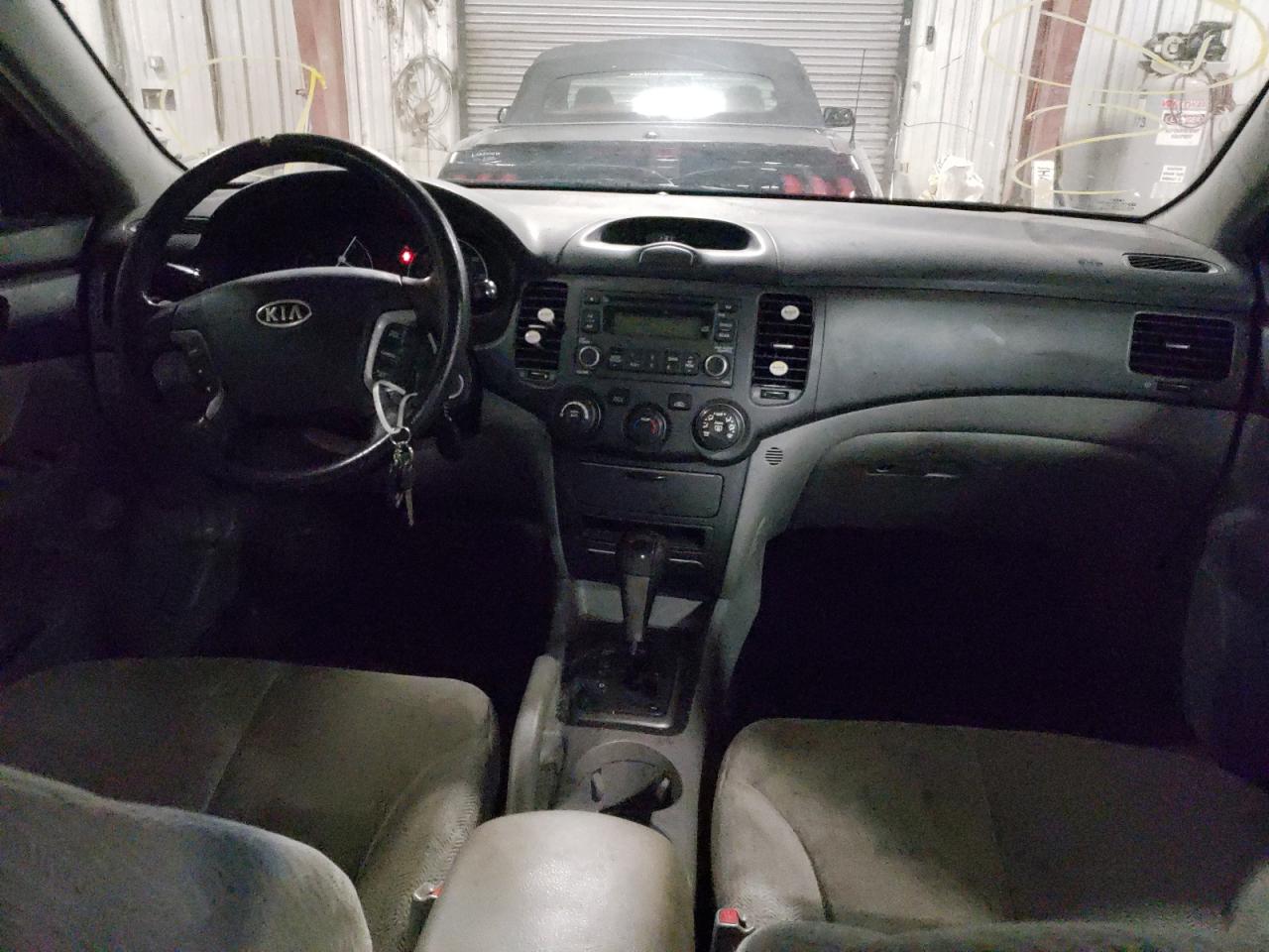 Photo 9 from auction – 2008 KIA OPTIMA LX with VIN KNAGE123385203392