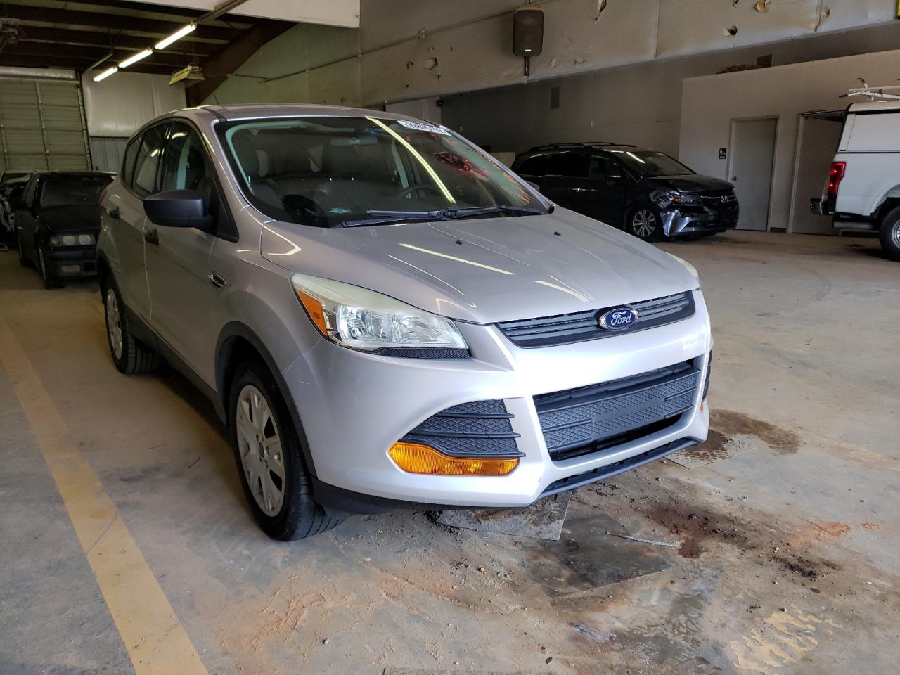 FORD ESCAPE S 2013 with VIN 1FMCU0F76DUD65072 - Photo from auction