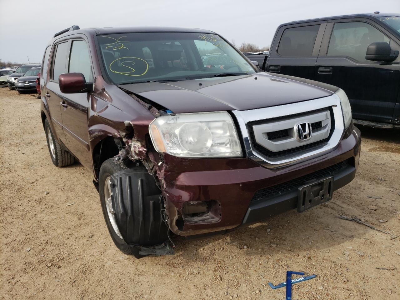 HONDA PILOT EXL 2011 with VIN 5FNYF4H57BB090129 - Photo from auction