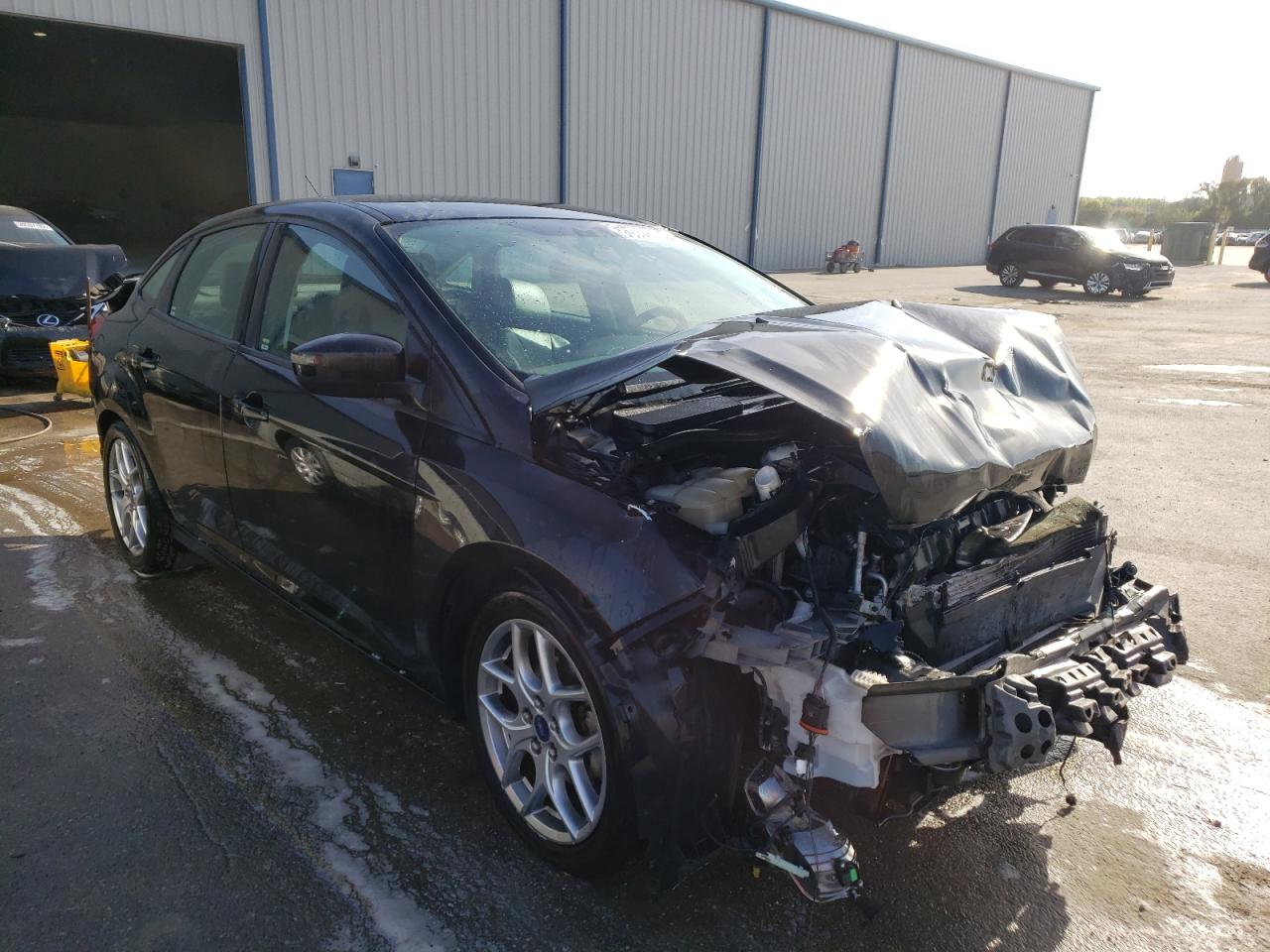 FORD FOCUS SE 2015 with VIN 1FADP3F21FL284095 - Photo from auction