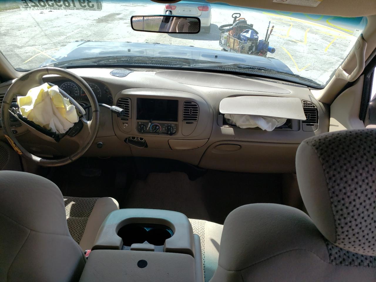 Photo 9 from auction – 2002 FORD F150 SUPER with VIN 1FTRW07642KB27633