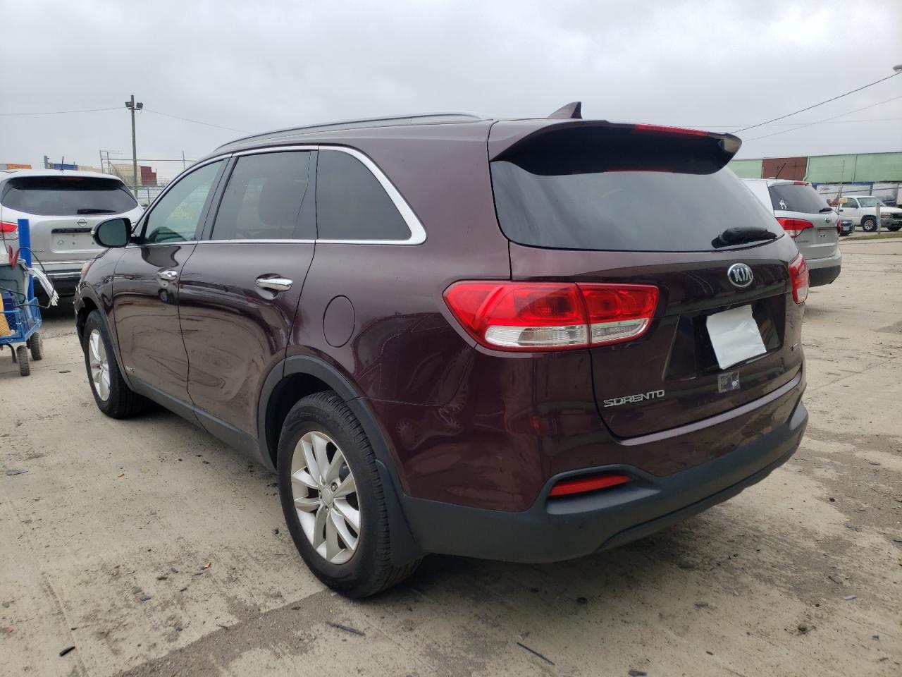 Photo 3 from auction – 2016 KIA SORENTO LX with VIN 5XYPGDA33GG128098