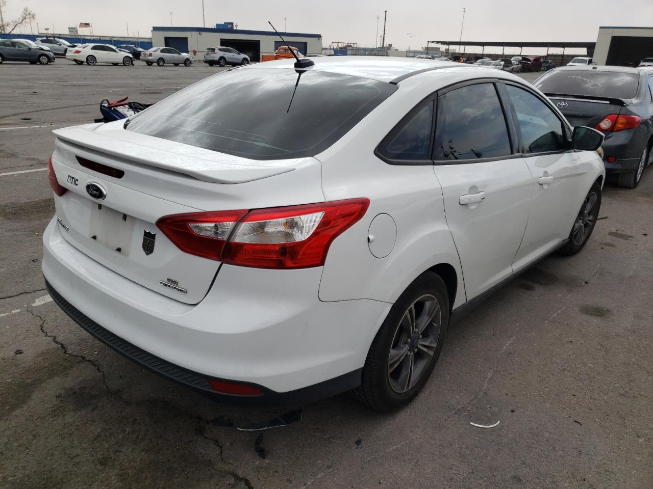 Photo 4 from auction – 2014 FORD FOCUS SE with VIN 1FADP3F20EL460410