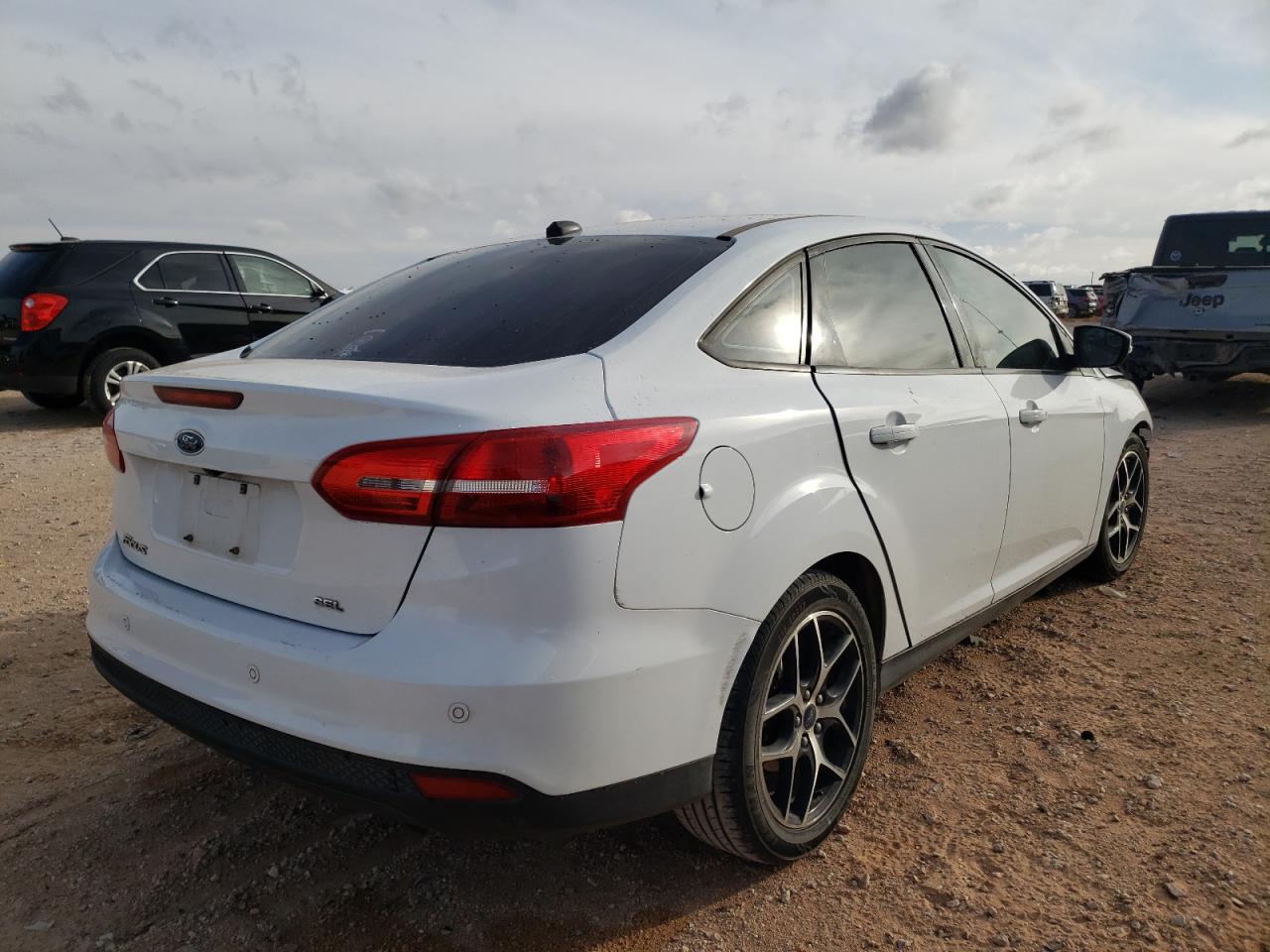 Photo 4 from auction – 2017 FORD FOCUS SEL with VIN 1FADP3H21HL342013