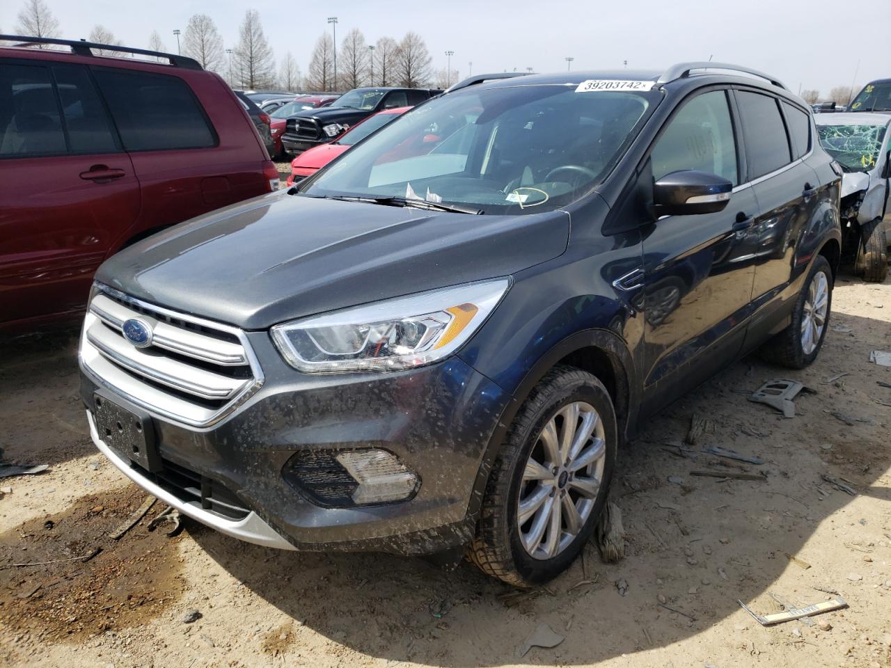 Photo 2 from auction – 2017 FORD ESCAPE TIT with VIN 1FMCU0JD0HUE05603