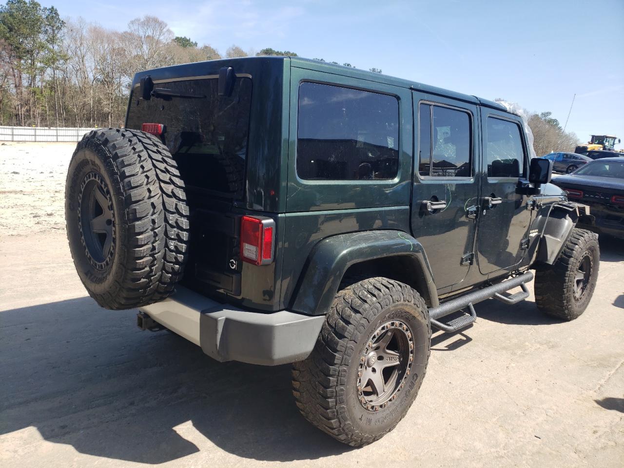 Photo 4 from auction – 2011 JEEP WRANGLER U with VIN 1J4BA5H14BL561183