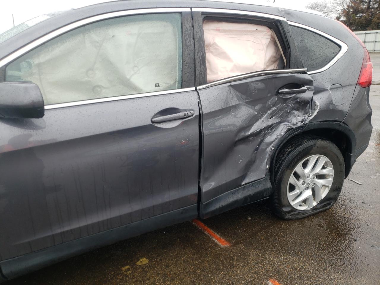 Photo 9 from auction – 2016 HONDA CR-V EXL with VIN 2HKRM4H75GH697389