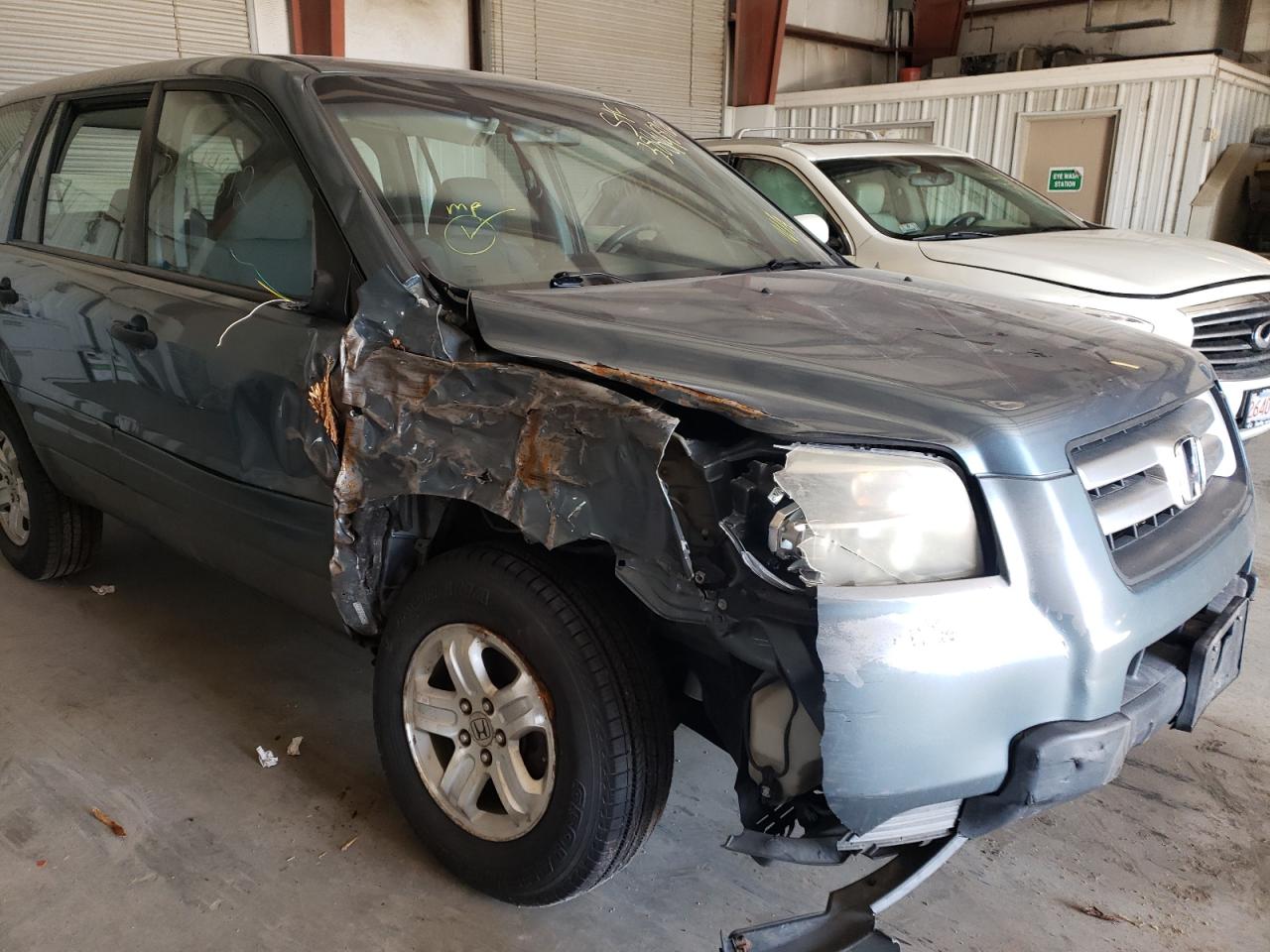 Photo 9 from auction – 2007 HONDA PILOT LX with VIN 5FNYF18117B028485