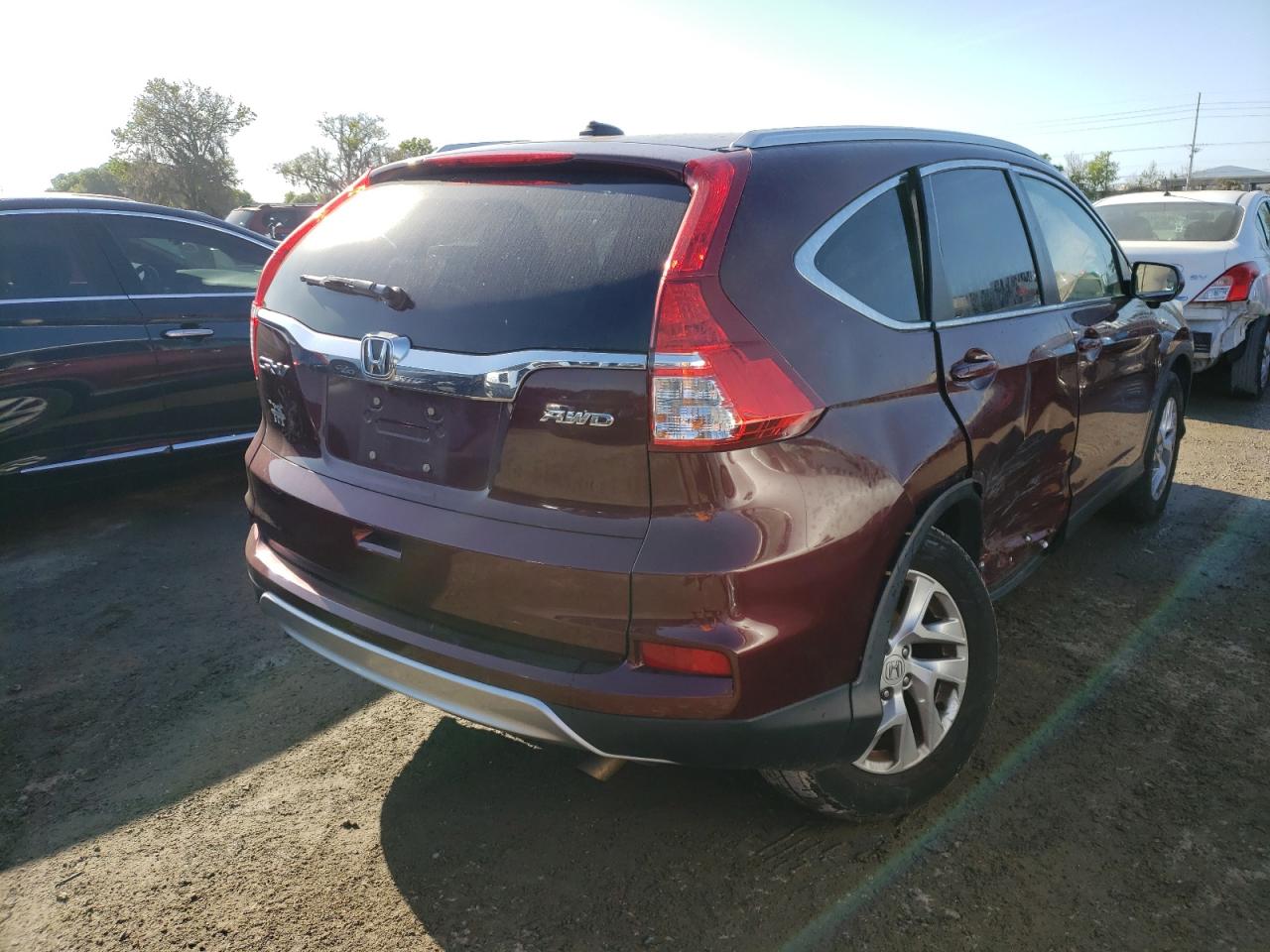 Photo 4 from auction – 2016 HONDA CR-V EXL with VIN 5J6RM4H76GL012404