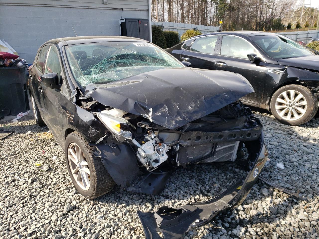 FORD FOCUS SE 2018 with VIN 1FADP3K27JL284584 - Photo from auction