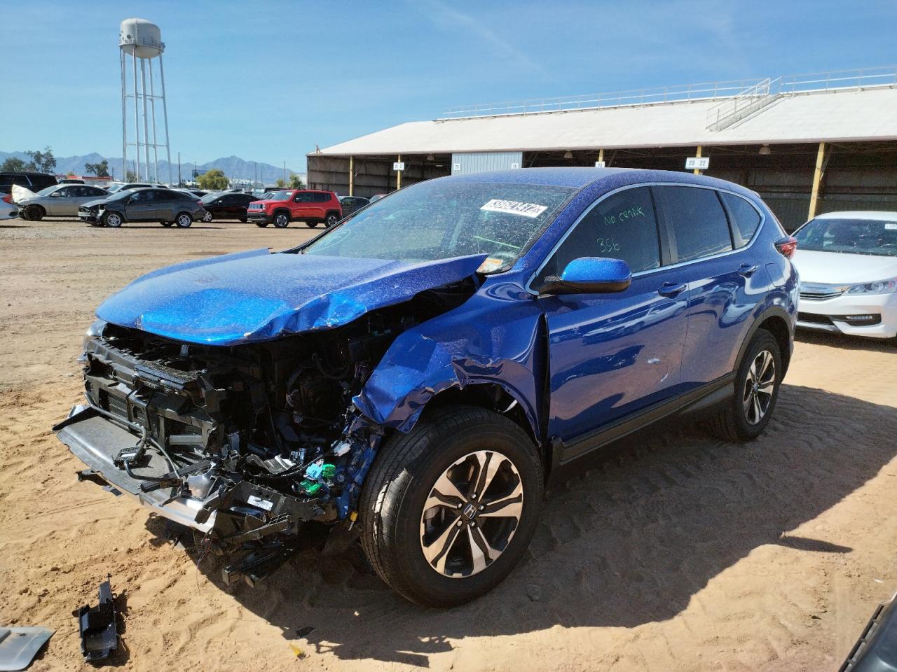Photo 2 from auction – 2022 HONDA CR-V SE with VIN 7FARW2H70NE009605