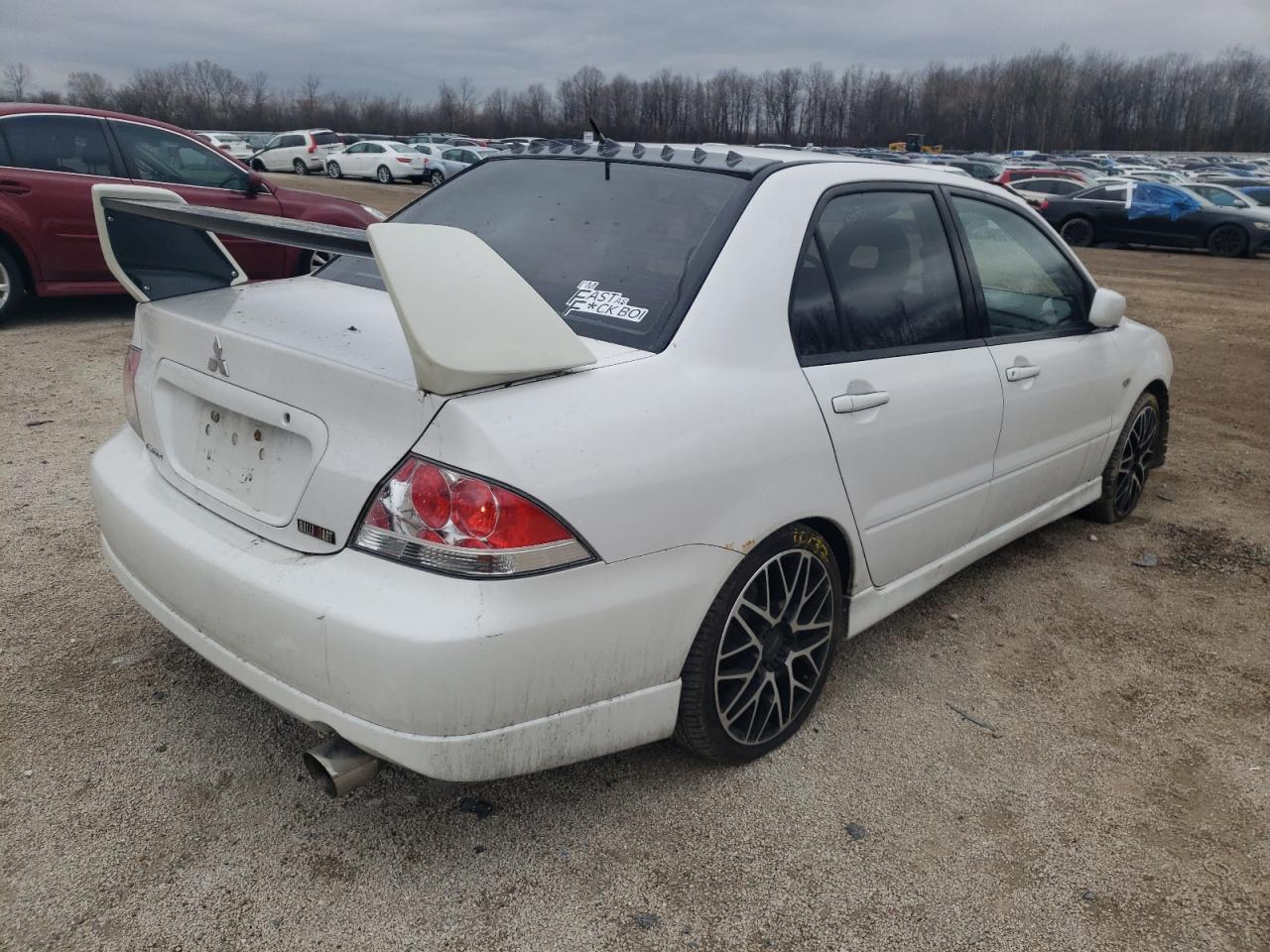 Photo 4 from auction – 2004 MITSUBISHI LANCER RAL with VIN JA3AJ66F44U043673