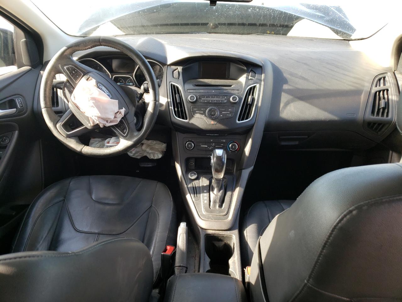 Photo 9 from auction – 2015 FORD FOCUS SE with VIN 1FADP3F21FL284095