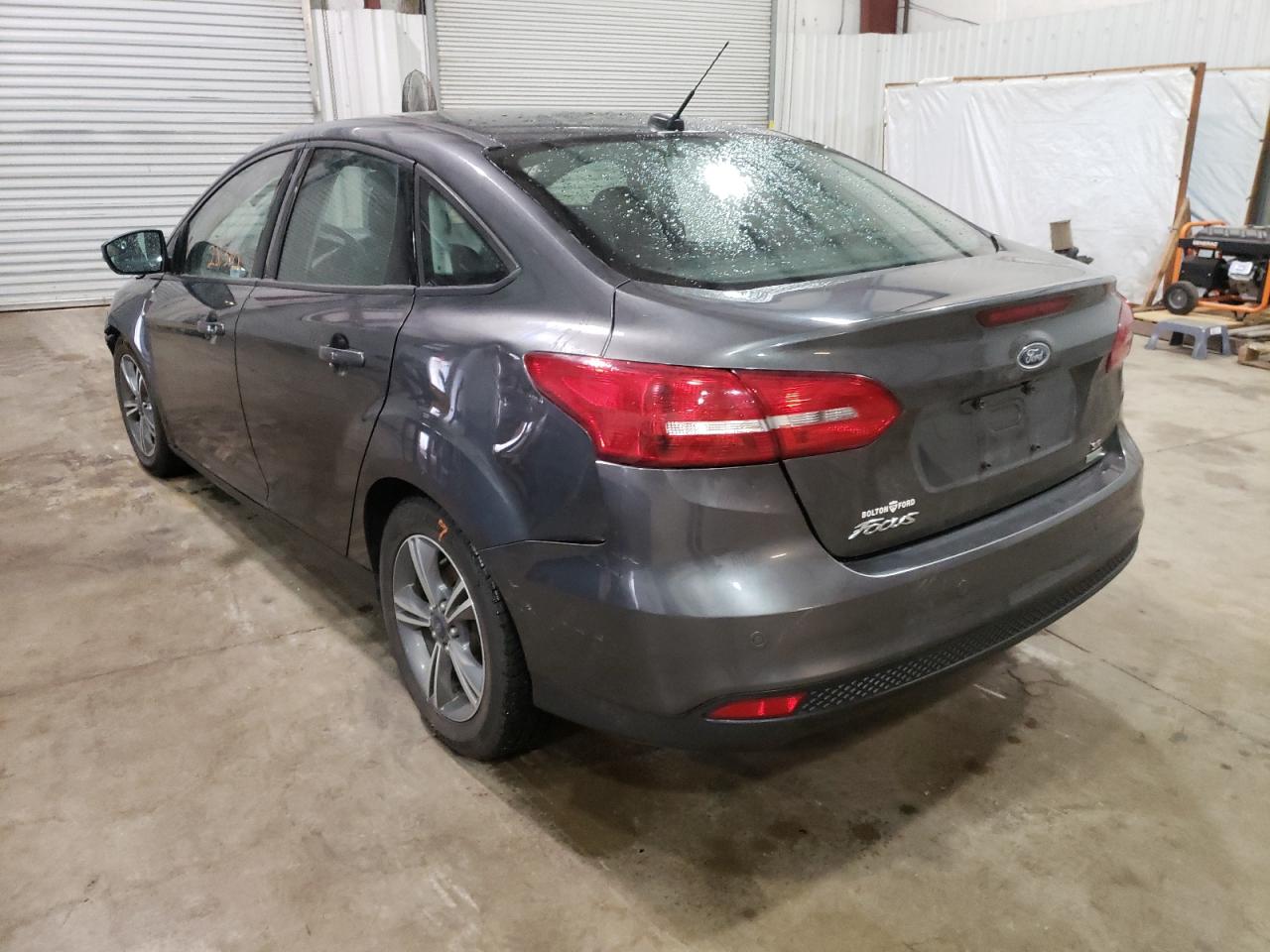 Photo 3 from auction – 2016 FORD FOCUS SE with VIN 1FADP3FE5GL393526
