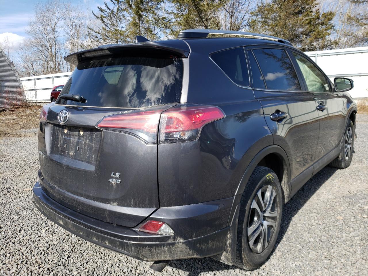 Photo 4 from auction – 2017 TOYOTA RAV4 LE with VIN JTMBFREV5HJ119913