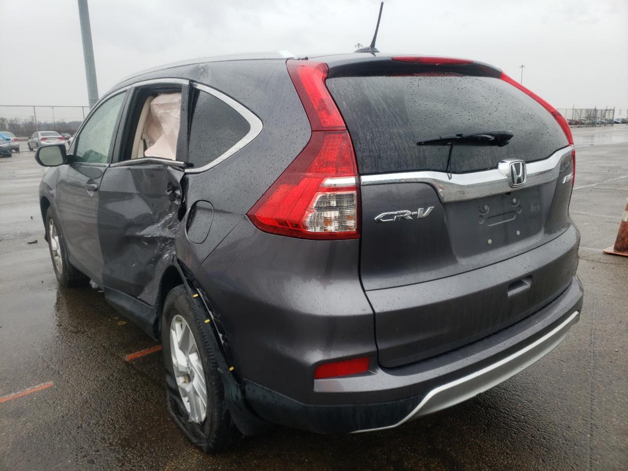 Photo 3 from auction – 2016 HONDA CR-V EXL with VIN 2HKRM4H75GH697389