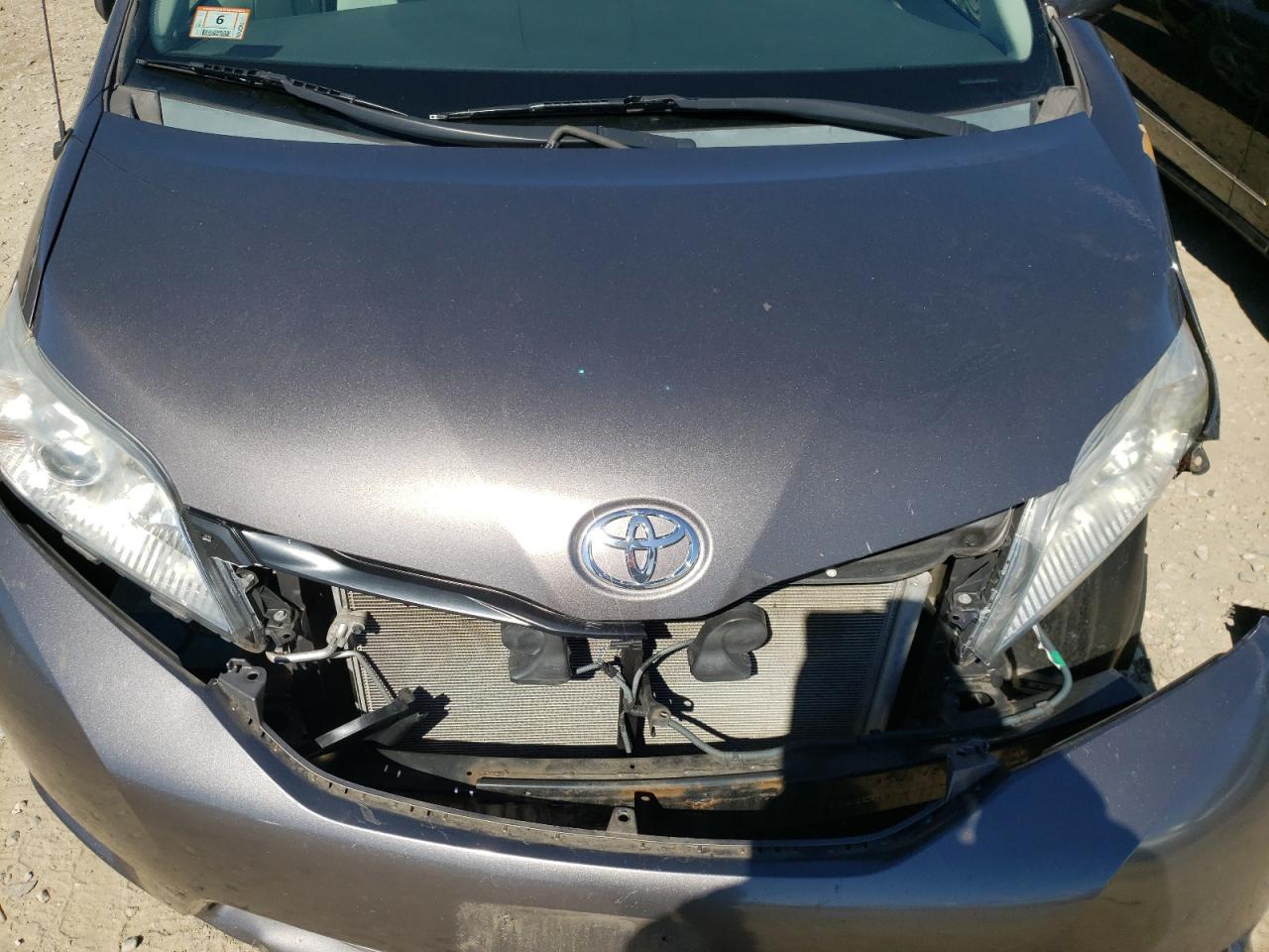 Photo 7 from auction – 2013 TOYOTA SIENNA LE with VIN 5TDKK3DC2DS357076