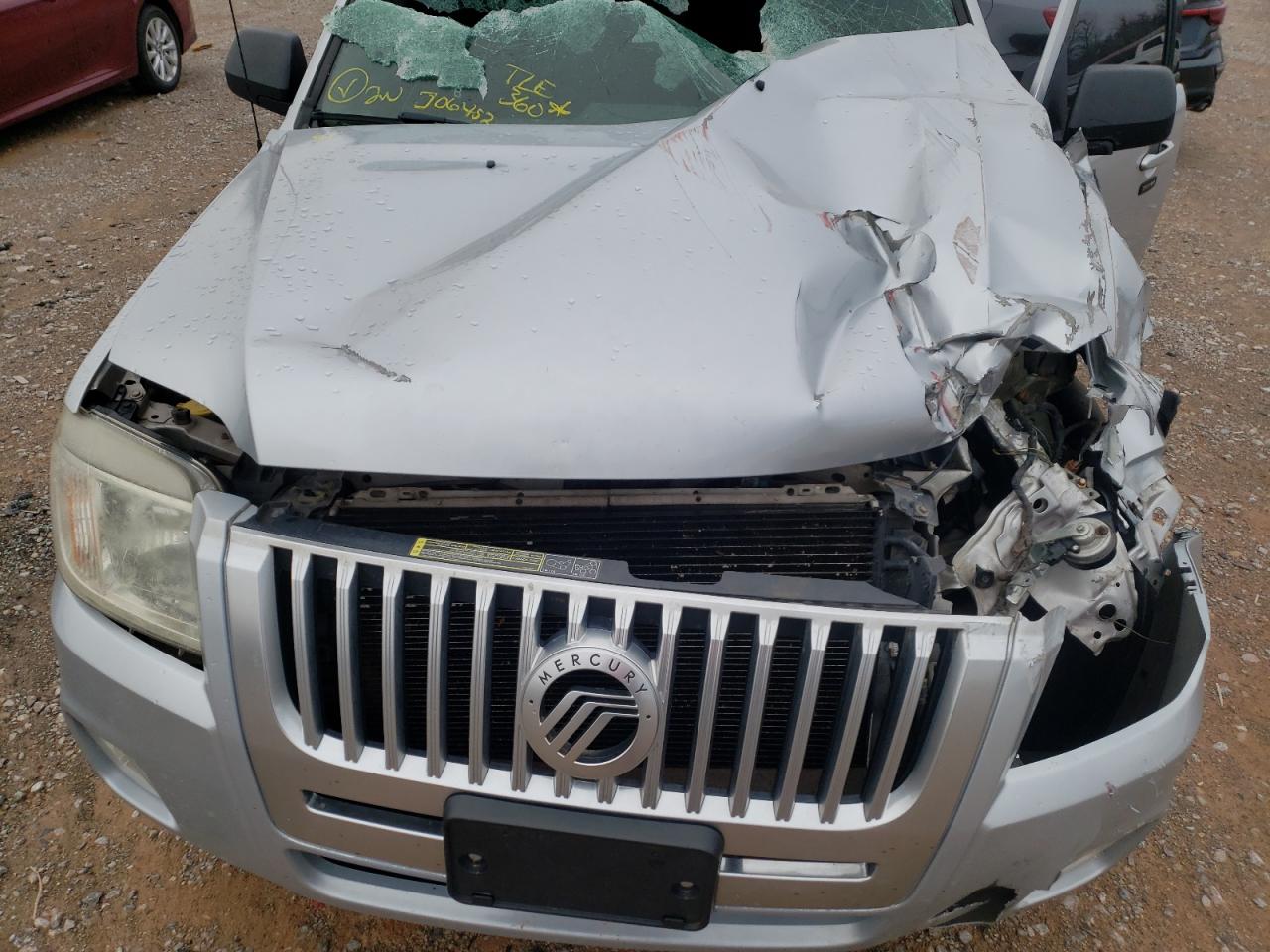 Photo 7 from auction – 2011 MERCURY MARINER with VIN 4M2CN8B73BKJ06452