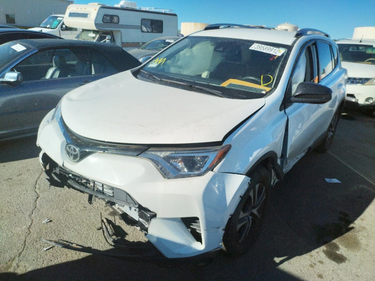 Photo 2 from auction – 2017 TOYOTA RAV4 LE with VIN JTMZFREV0HJ130073