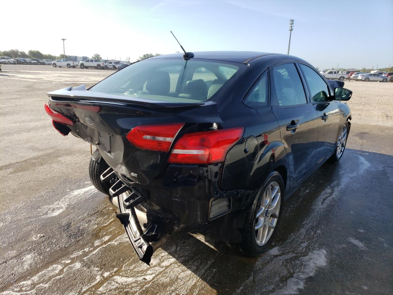 Photo 4 from auction – 2015 FORD FOCUS SE with VIN 1FADP3F21FL284095