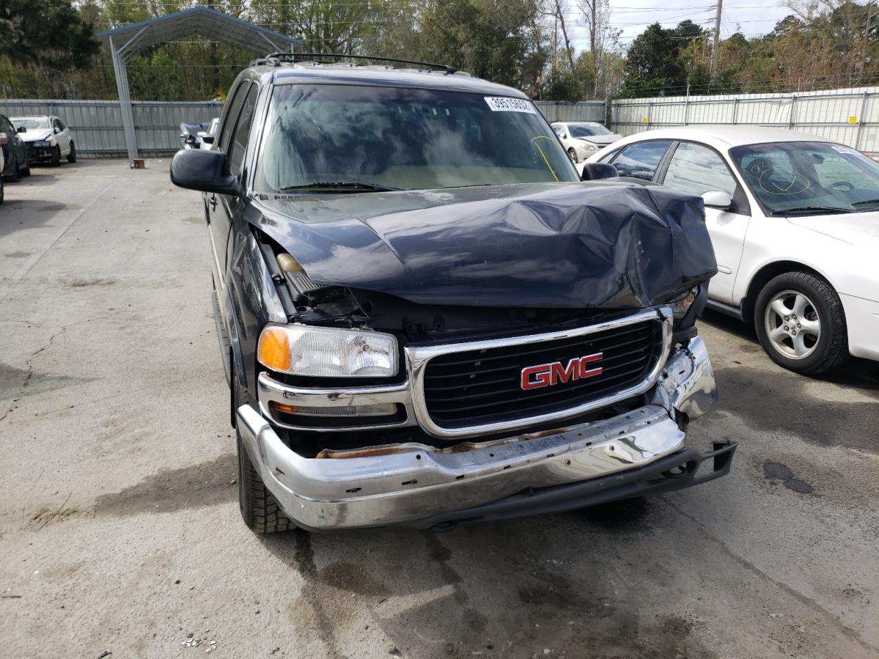 Photo 9 from auction – 2000 GMC YUKON with VIN 1GKEK13TXYJ140708