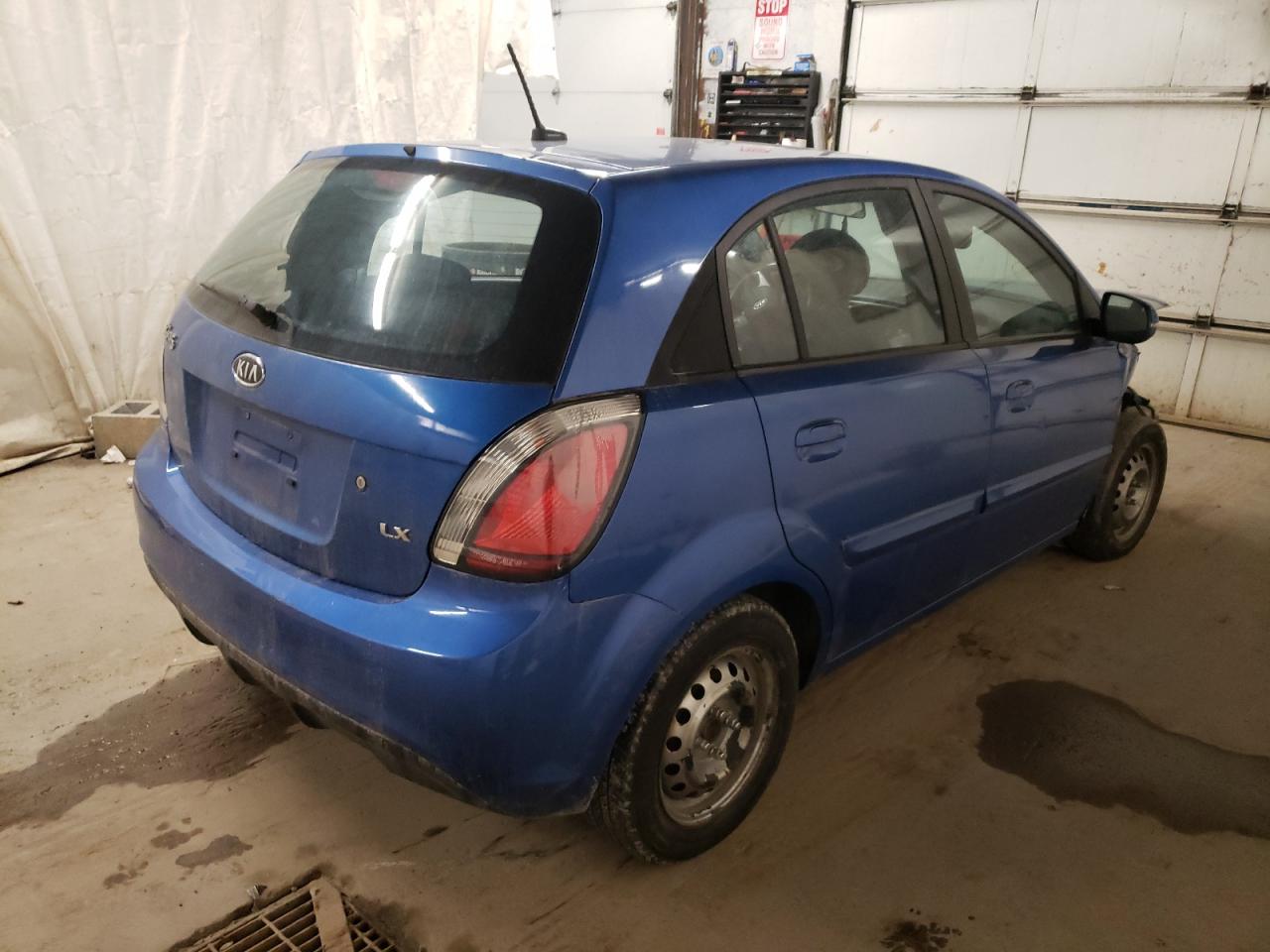Photo 4 from auction – 2010 KIA RIO LX with VIN KNADH5A34A6652647
