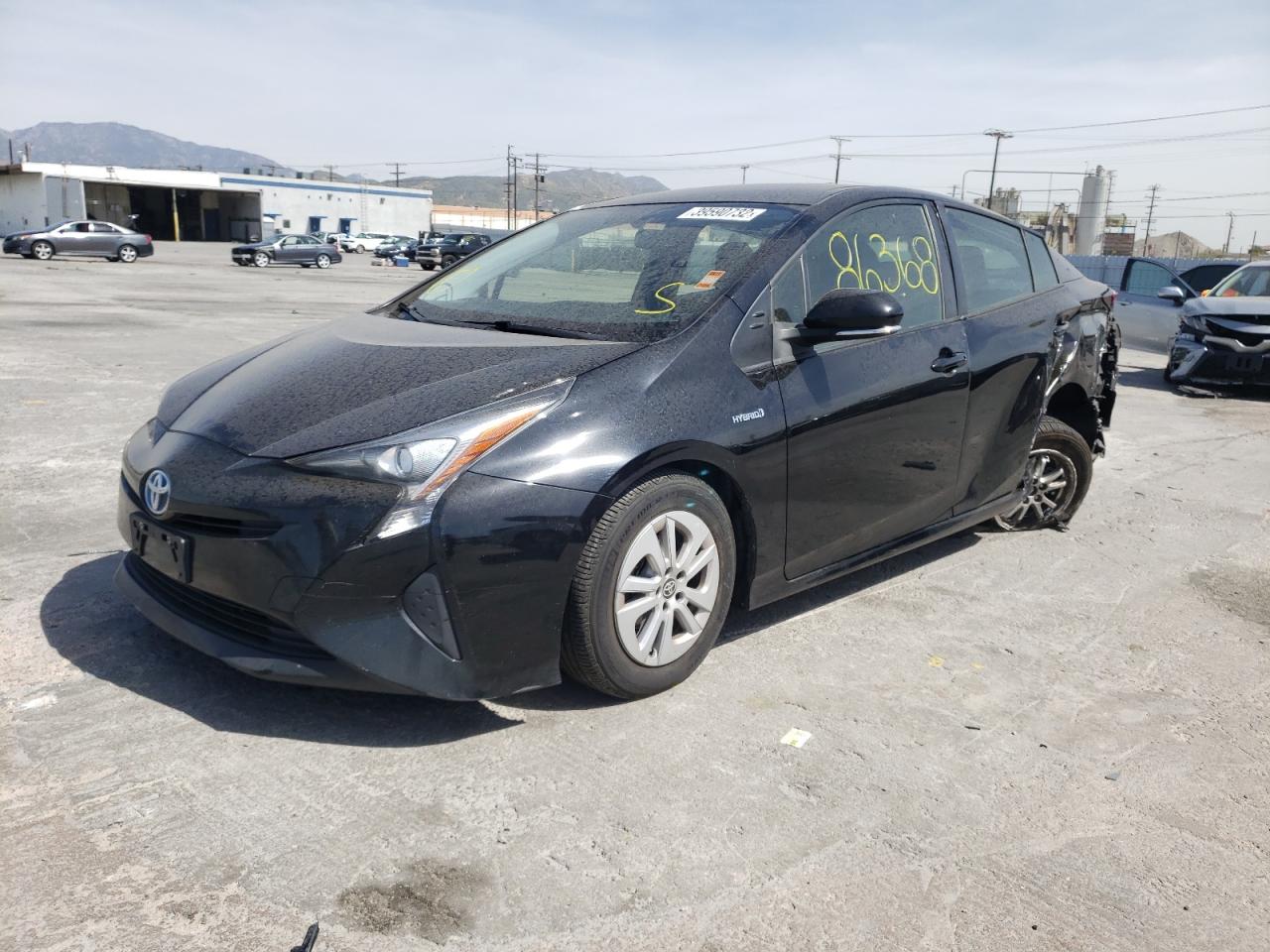 Photo 2 from auction – 2016 TOYOTA PRIUS with VIN JTDKBRFUXG3512262