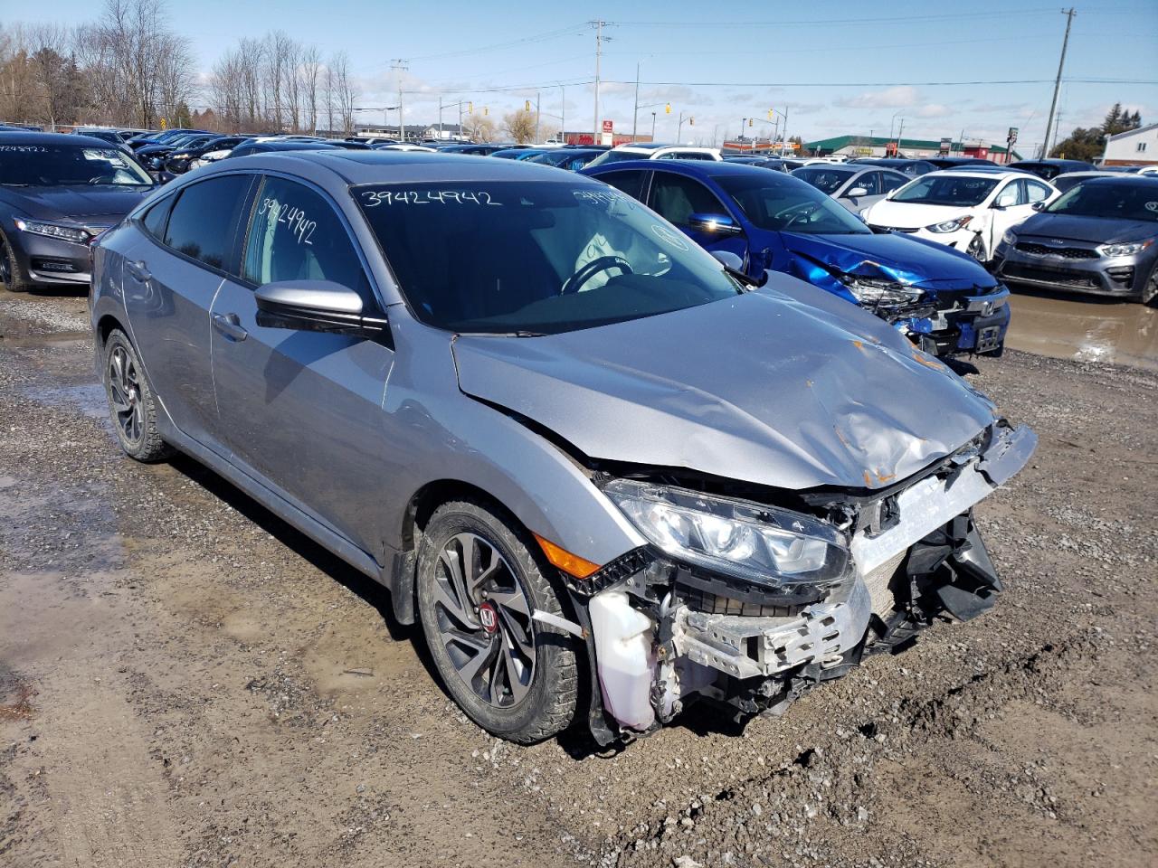HONDA CIVIC EX 2017 with VIN 2HGFC2F80HH040596 - Photo from auction
