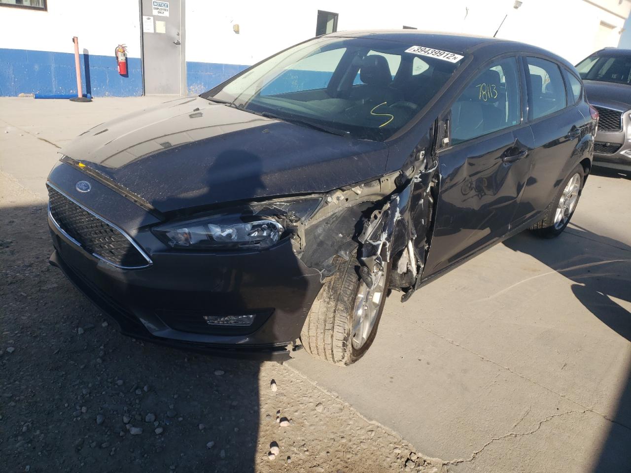 Photo 2 from auction – 2015 FORD FOCUS SE with VIN 1FADP3K25FL341145