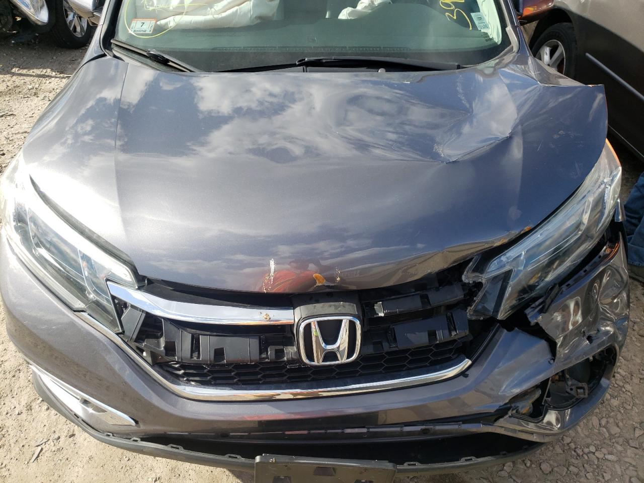 Photo 7 from auction – 2015 HONDA CR-V EXL with VIN 2HKRM4H76FH703375