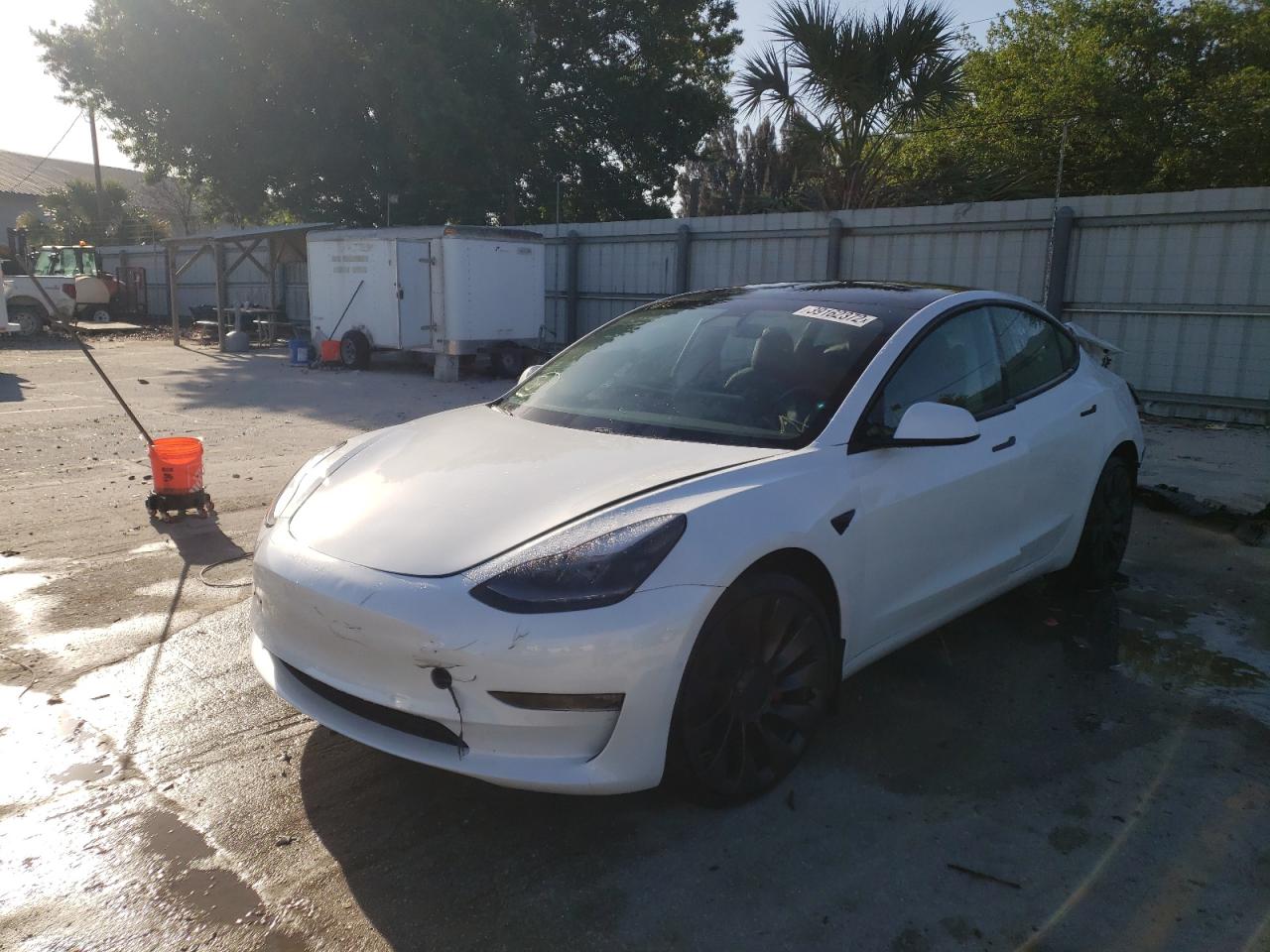 Photo 2 from auction – 2021 TESLA MODEL 3 with VIN 5YJ3E1ECXMF991058