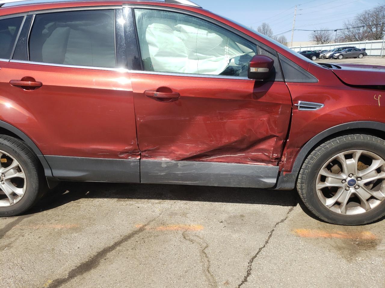 Photo 9 from auction – 2016 FORD ESCAPE TIT with VIN 1FMCU0JXXGUC40605