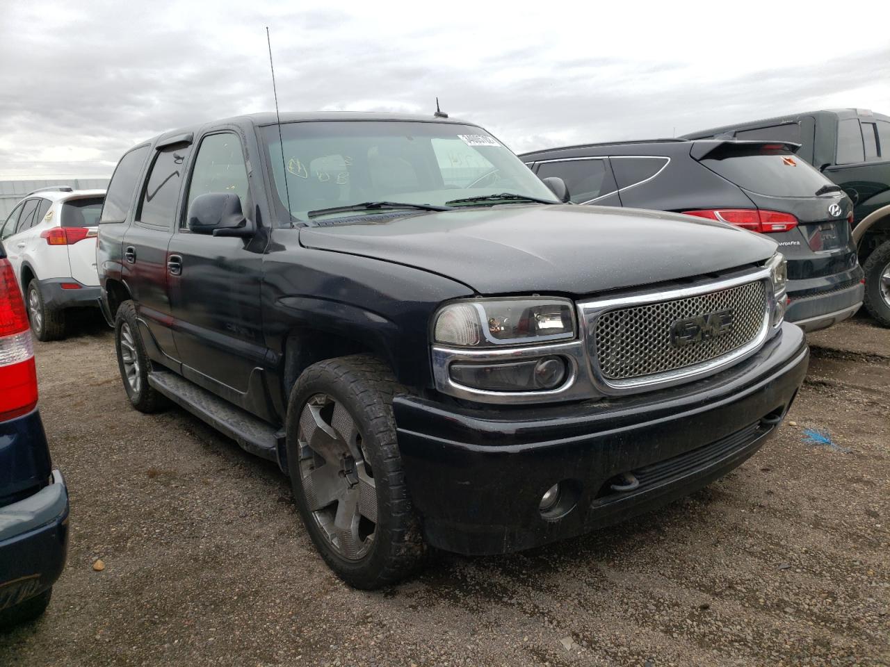 GMC DENALI 2002 with VIN 1GKEK63UX2J321787 - Photo from auction