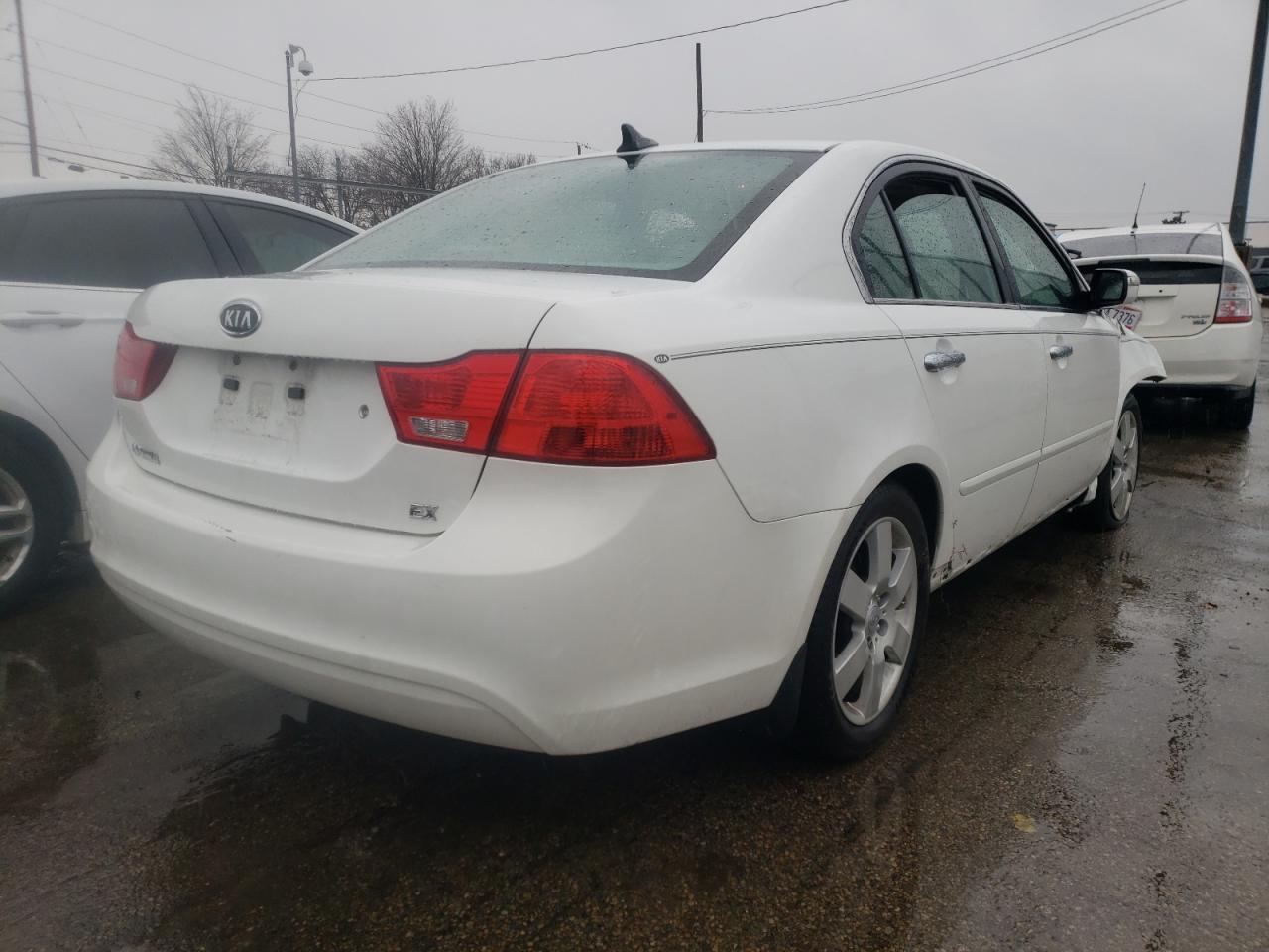 Photo 4 from auction – 2010 KIA OPTIMA EX with VIN KNAGH4A8XA5398953