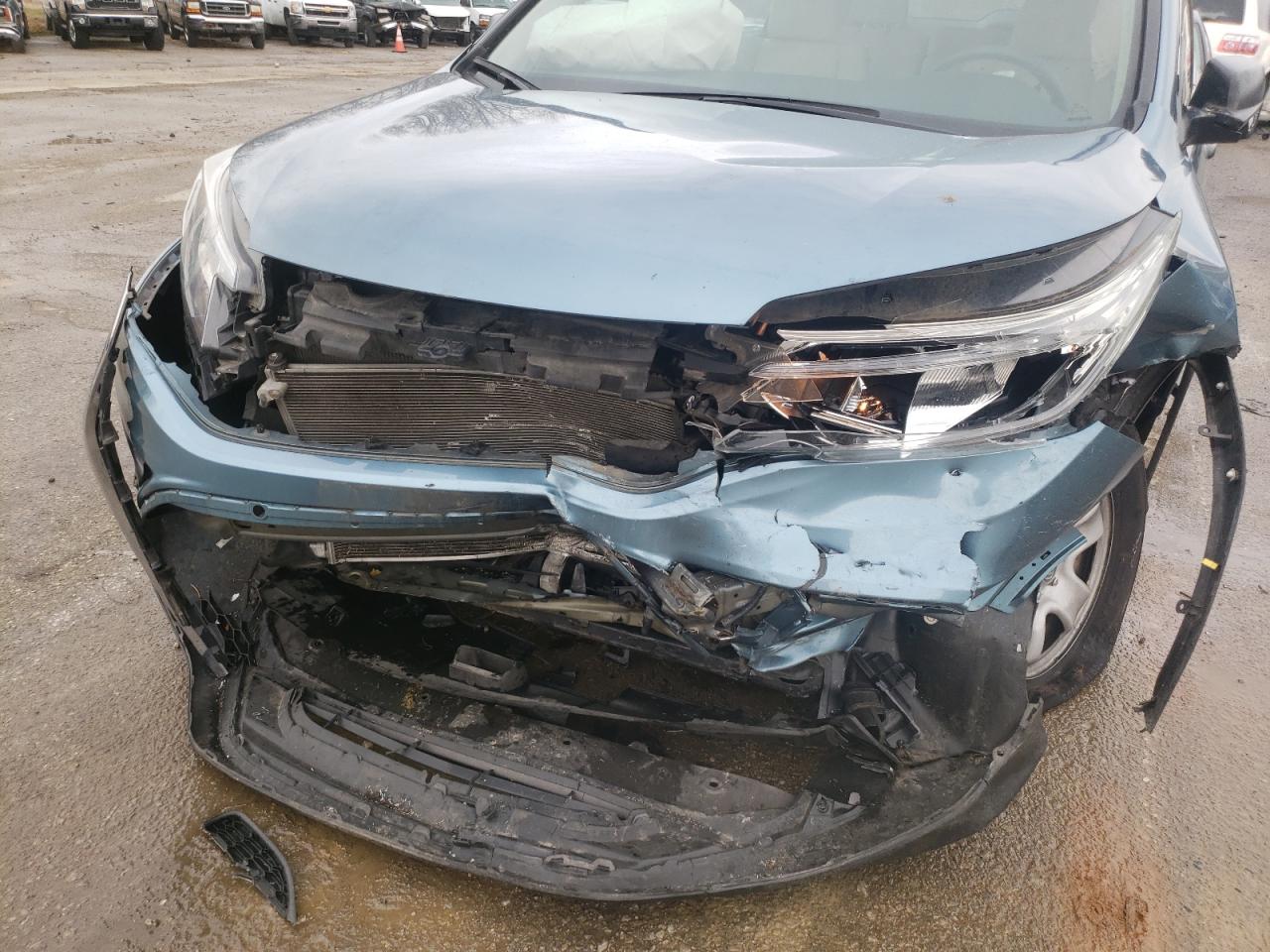 Photo 9 from auction – 2015 HONDA CR-V LX with VIN 5J6RM4H32FL095888