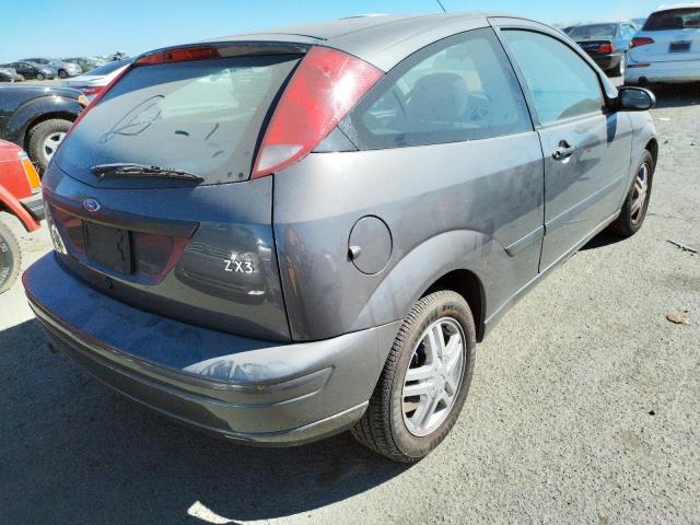 Photo 4 from auction – 2004 FORD FOCUS with VIN 3FAFP31Z54R123244