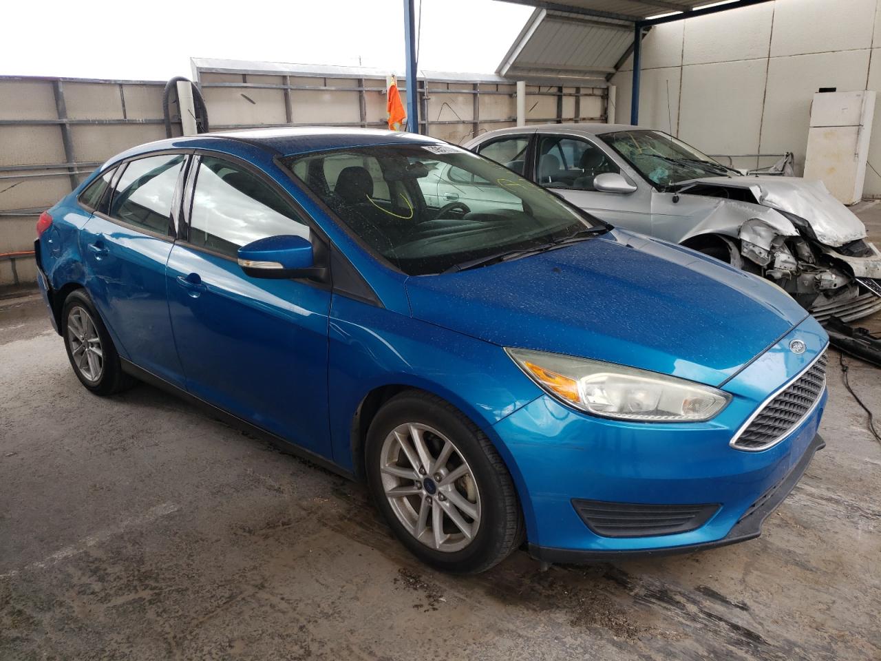FORD FOCUS SE 2015 with VIN 1FADP3F22FL240526 - Photo from auction
