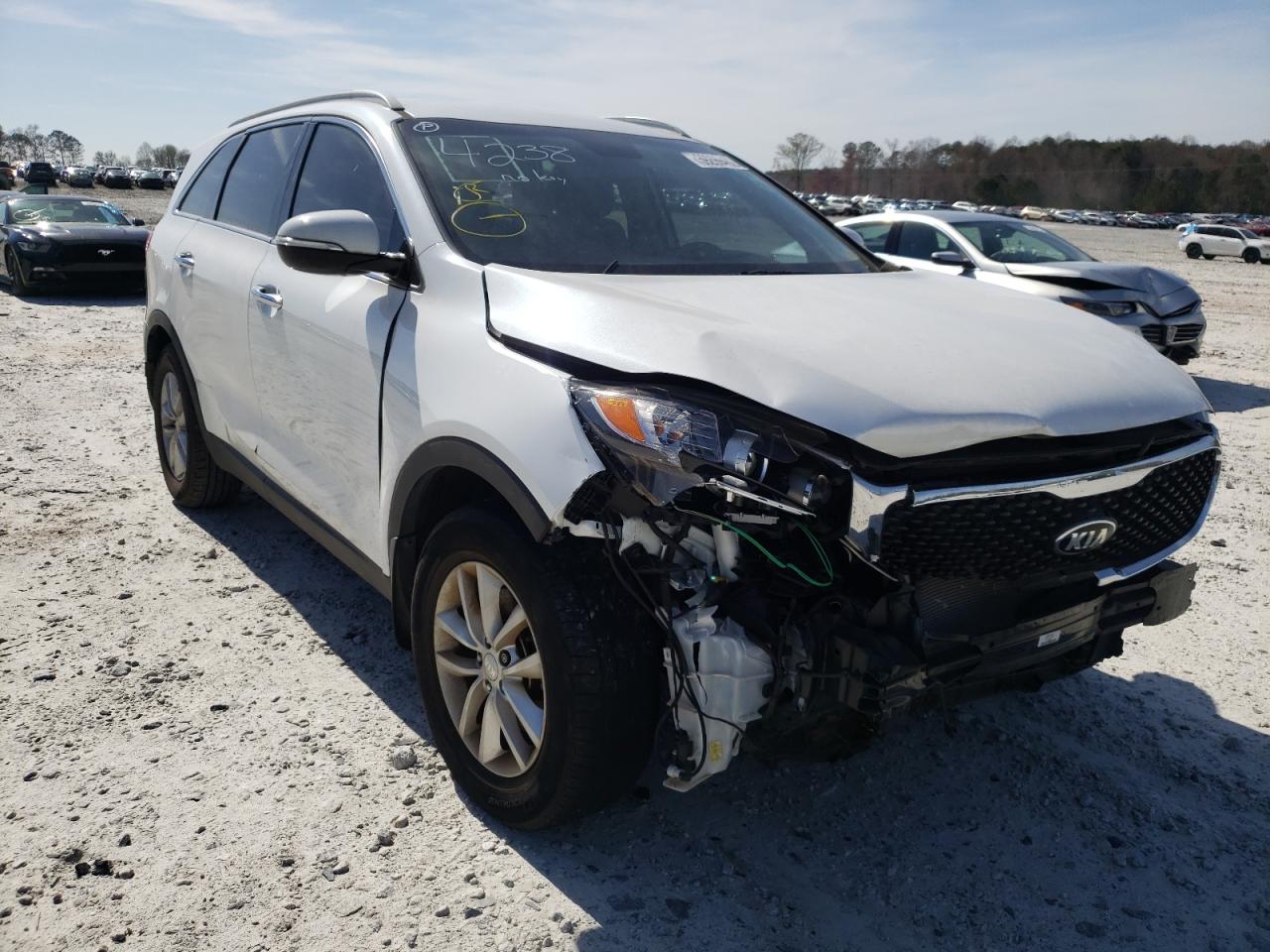 KIA SORENTO LX 2016 with VIN 5XYPG4A50GG154238 - Photo from auction