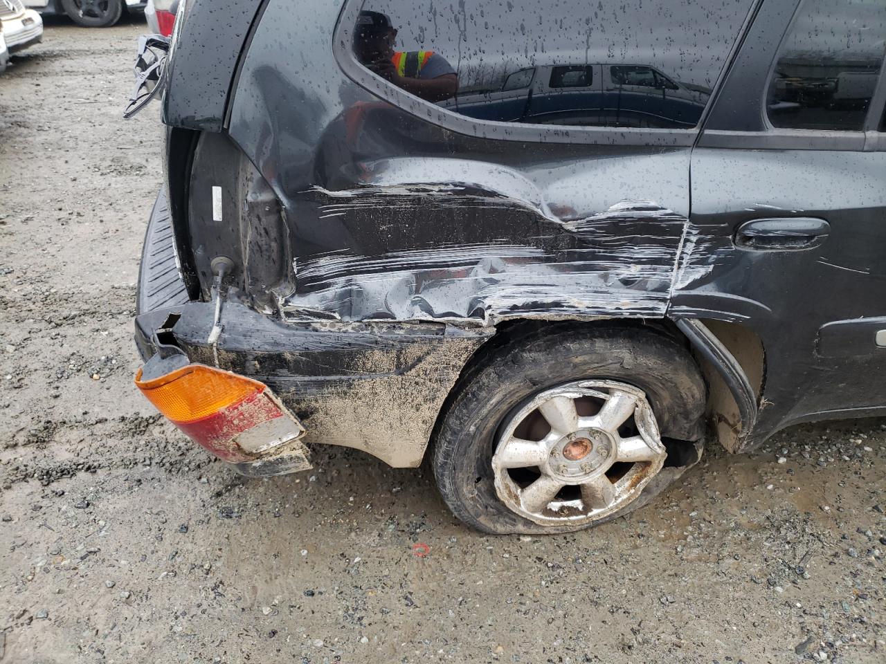 Photo 9 from auction – 2003 GMC ENVOY with VIN 1GKDS13S232194350