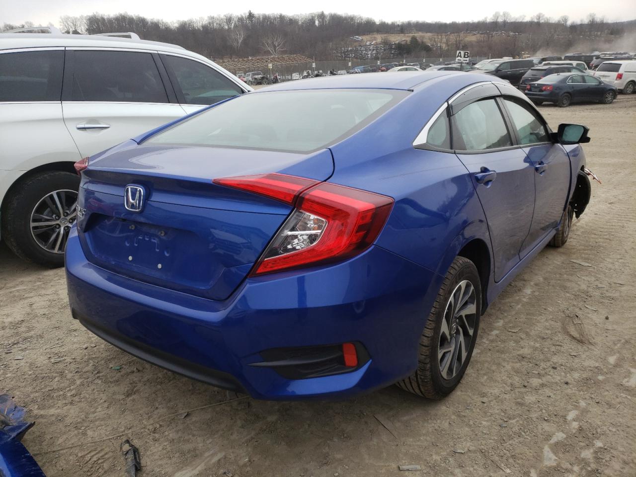 Photo 4 from auction – 2016 HONDA CIVIC EX with VIN 19XFC2F74GE080468